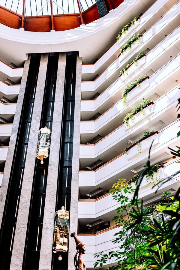 Rahat Palace Hotel Almaty Exterior photo The elevators at the Hyatt Regency Atlanta