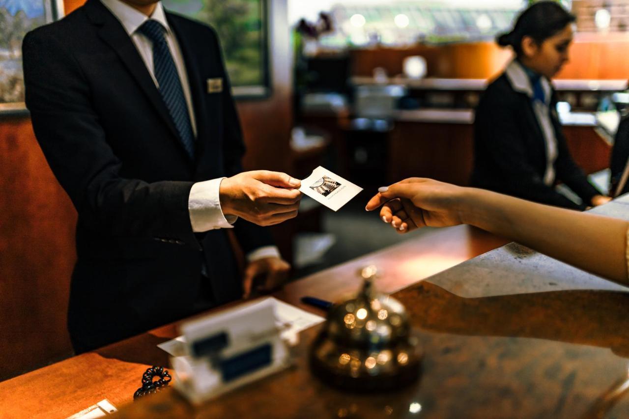 Rahat Palace Hotel Almaty Exterior photo A hotel key card