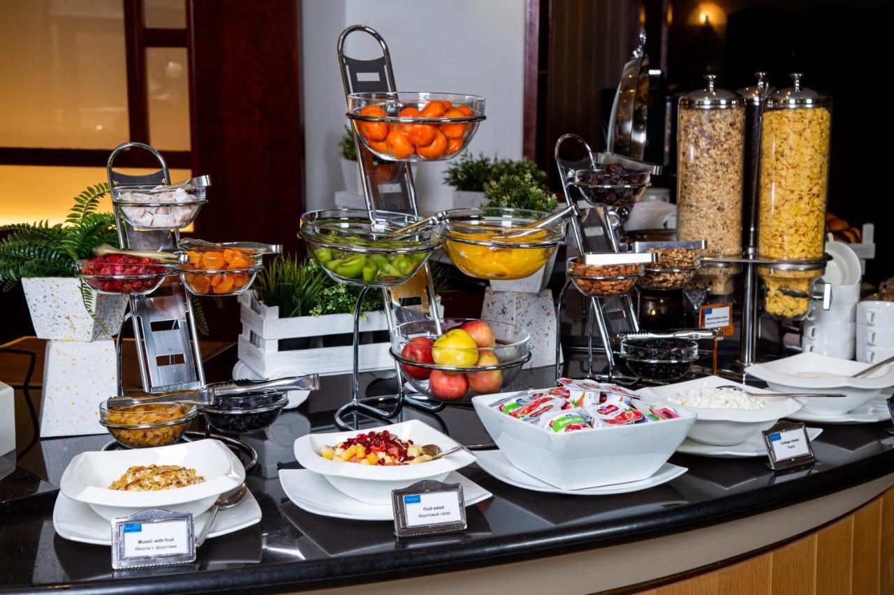 Rahat Palace Hotel Almaty Exterior photo A breakfast buffet
