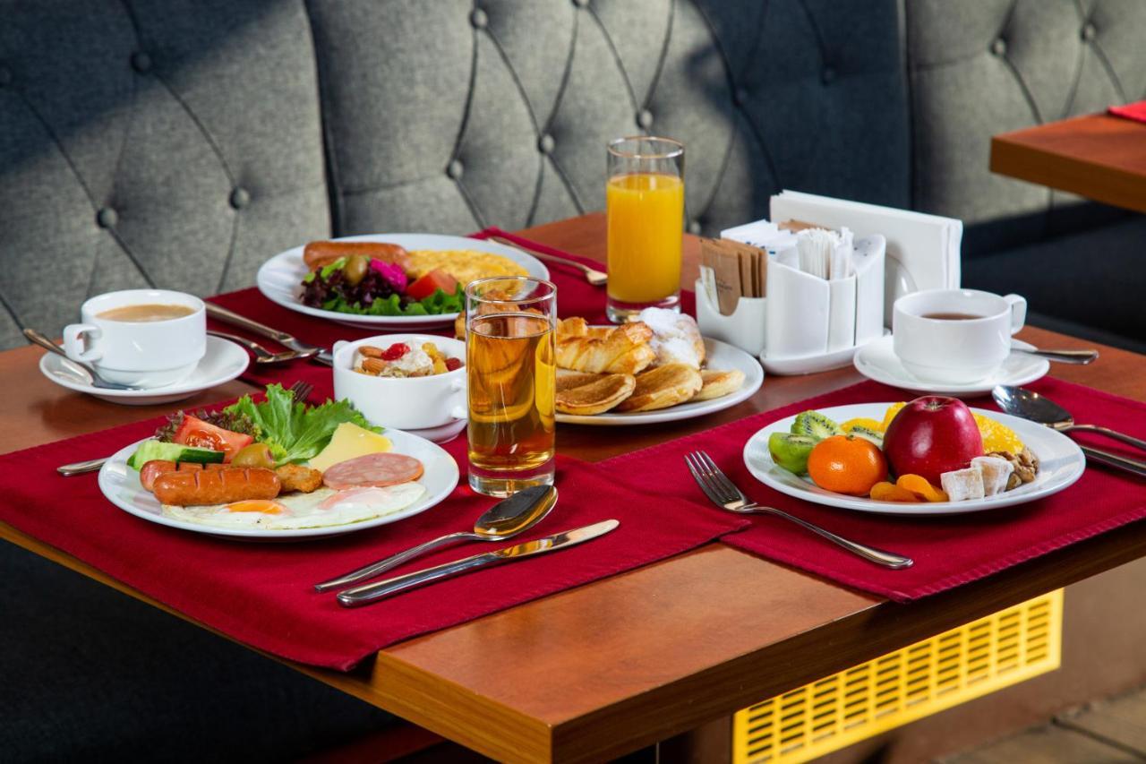 Rahat Palace Hotel Almaty Exterior photo A breakfast table