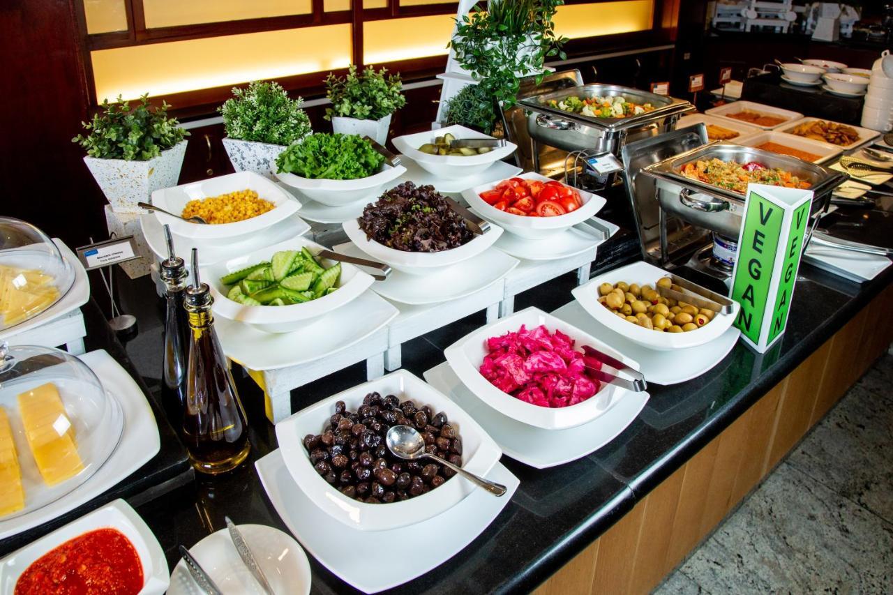 Rahat Palace Hotel Almaty Exterior photo A salad bar