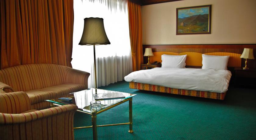 Rahat Palace Hotel Almaty Exterior photo A hotel room
