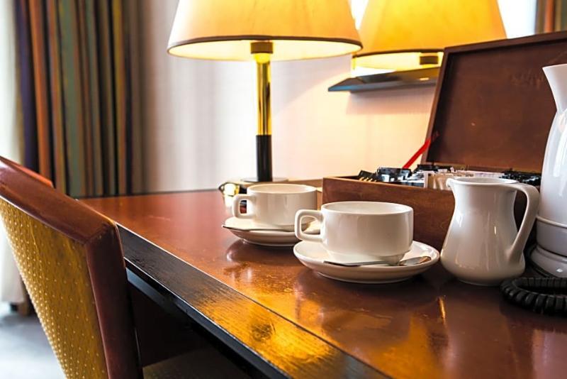 Rahat Palace Hotel Almaty Exterior photo A tea tray in a hotel room